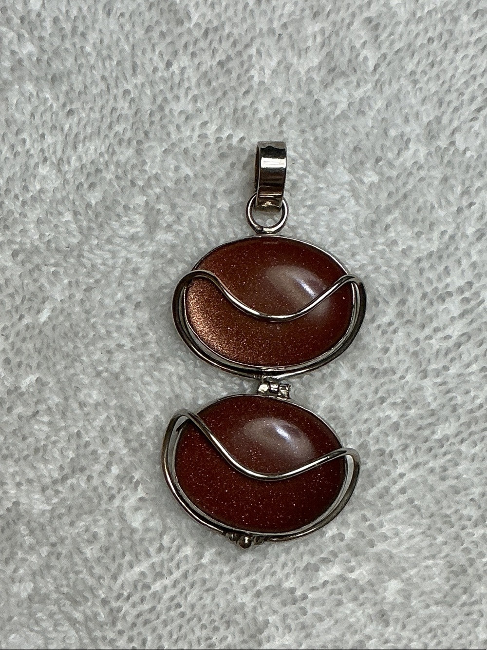 Silver-Tone Pink Goldstone Double Oval Pendant